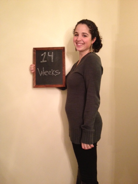 14 weeks and the bump is starting to show even through sweaters. 