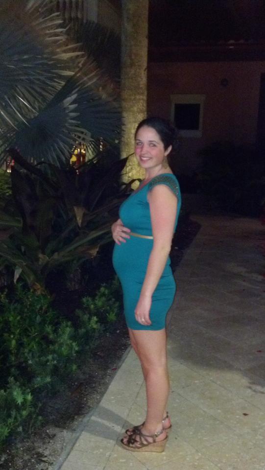 I didn't bring my little chalkboard with me, but this is our 18 week belly pic.