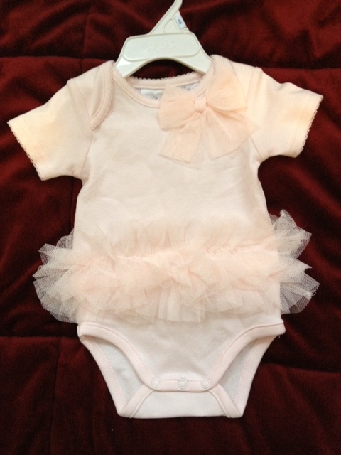 Baby Richards' outfit for her first official outing at Taryn's wedding this September.