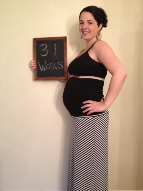 31 weeks and baby is running out of room in there!
